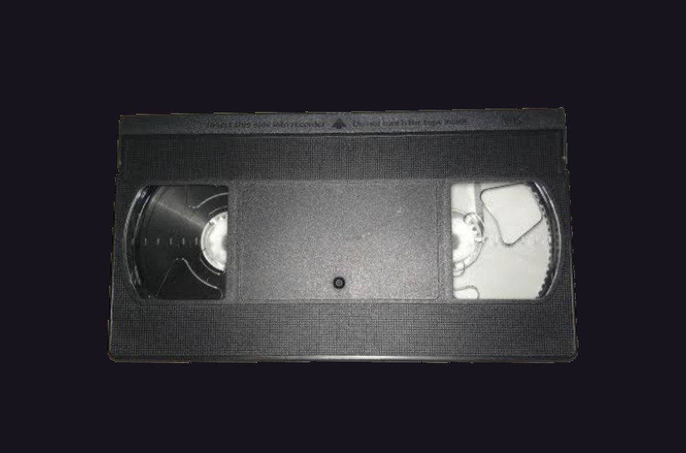 Black VHS cassette representing private home-video viewing.